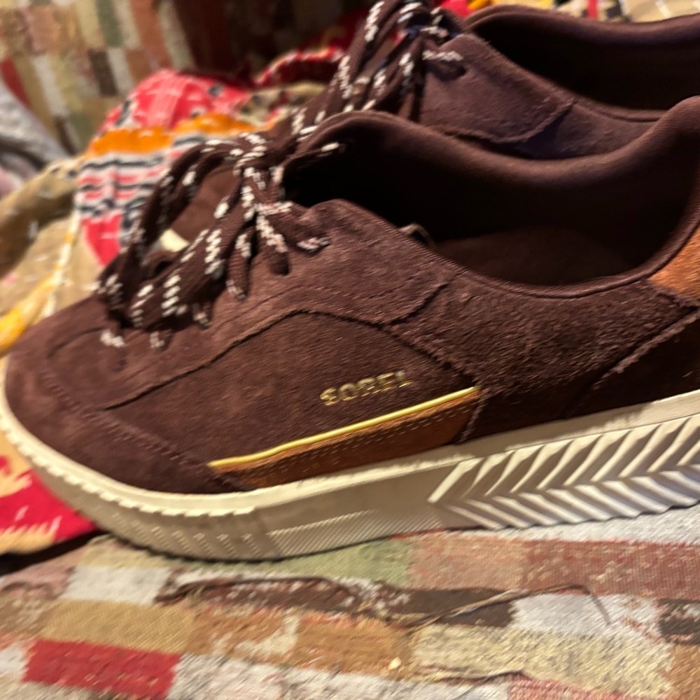 Sorel Women's ONA AVE™ T-Toe Sneakers in a Redwood, Rustic, and Brown colorway.